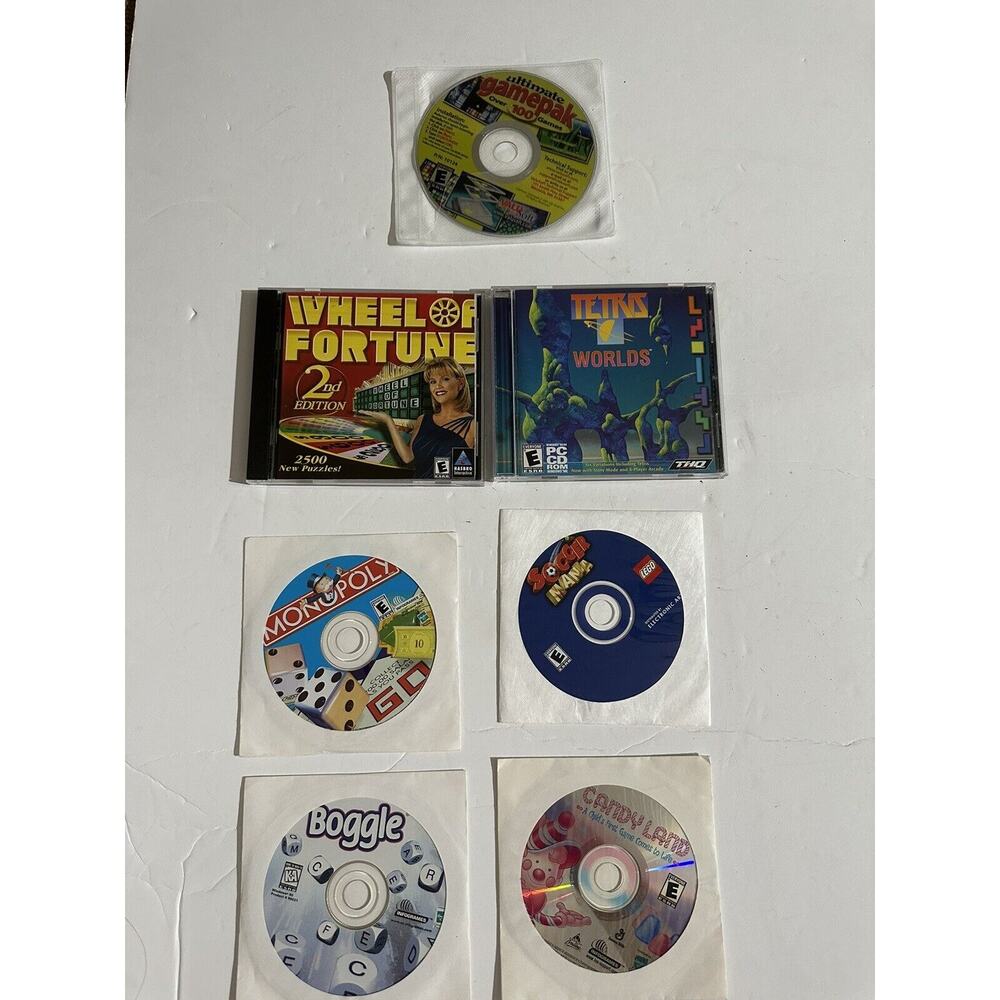 PC Game Lot 7 Gamepack 100 Monopoly Boggle Tetris Candyland Soccer Wheel Fortune